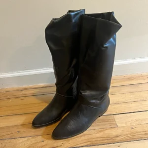 Bottes d’équitation hautes noires à enfiler au genou pour femme, motif uni-